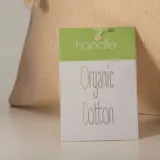 Pungă cadou din bumbac organic, 140 g/m², 10 x 14 cm – cu logo-ul firmei — fotografia 3